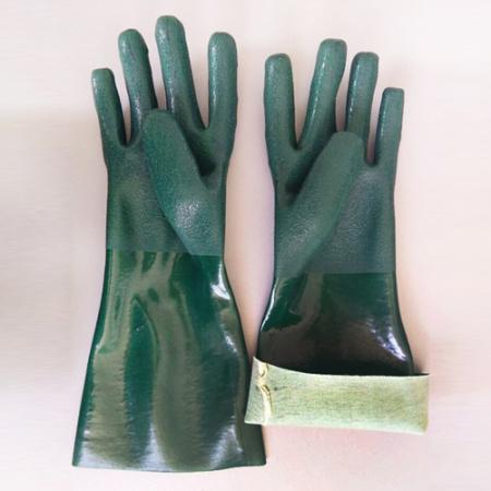 grüne Schutzhandschuhe