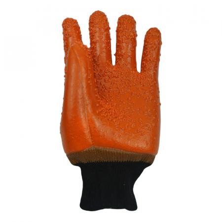 Brauner PVC-Tauchhandschuh Chips auf der Handfläche