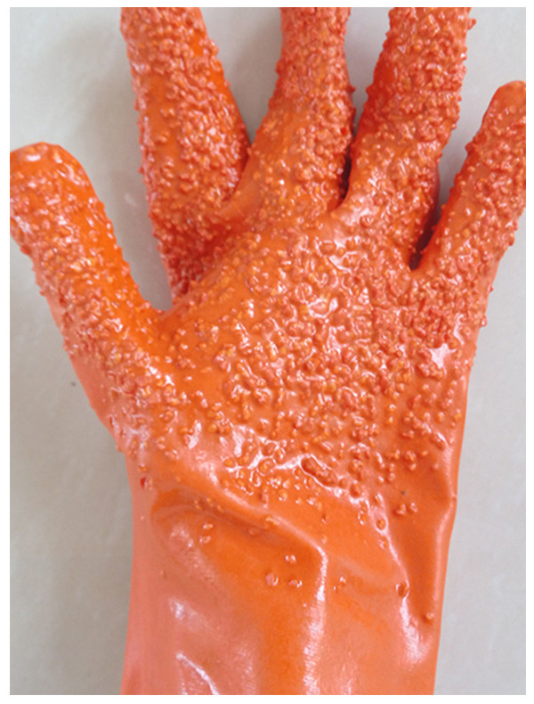 Orange pellet gloves for cold protection.jpg