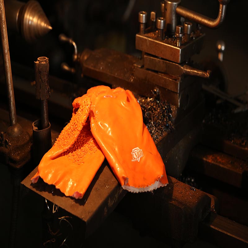 Luvas revestidas de PVC da máquina laranja